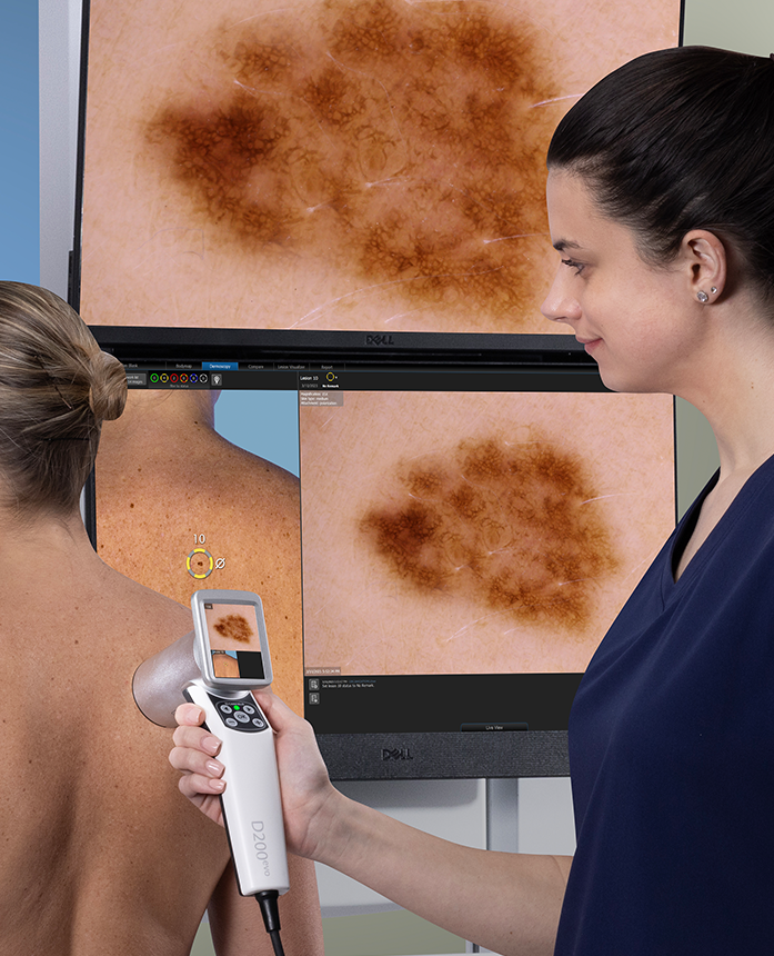 A medical professional taking pictures of a patient's lesions, which can be tagged in DermaGraphix