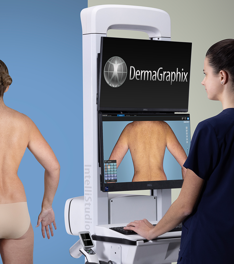 A medical professional using IntelliStudio to take photos of a patient's back